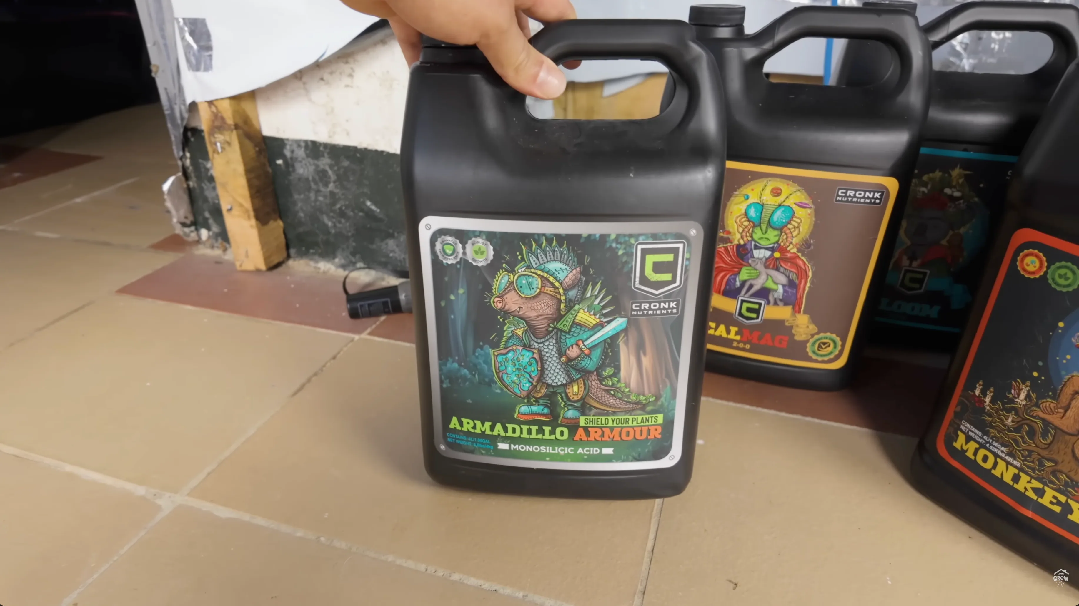 Cronk Nutrients bottles lined up for mixing - Micro, Grow, Bloom, CalMag, Armadillo Armour, Monkey Juice